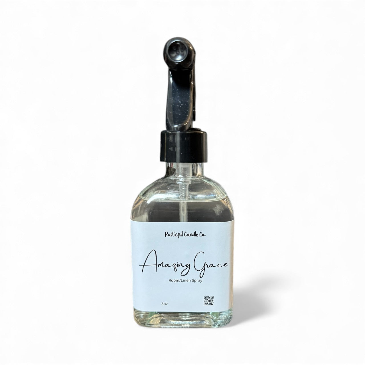 Clear spray bottle labeled 'Amazing Grace' on a white background
