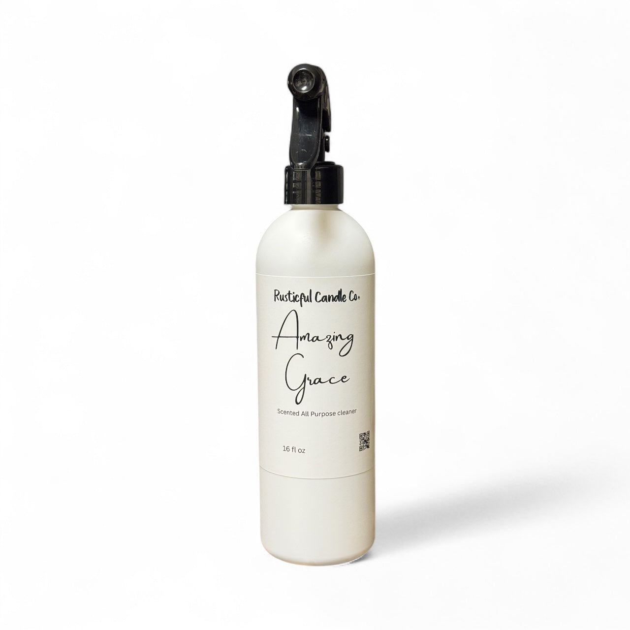 White spray bottle labeled 'Amazing Grace' from Beautiful Candle Co on a white background