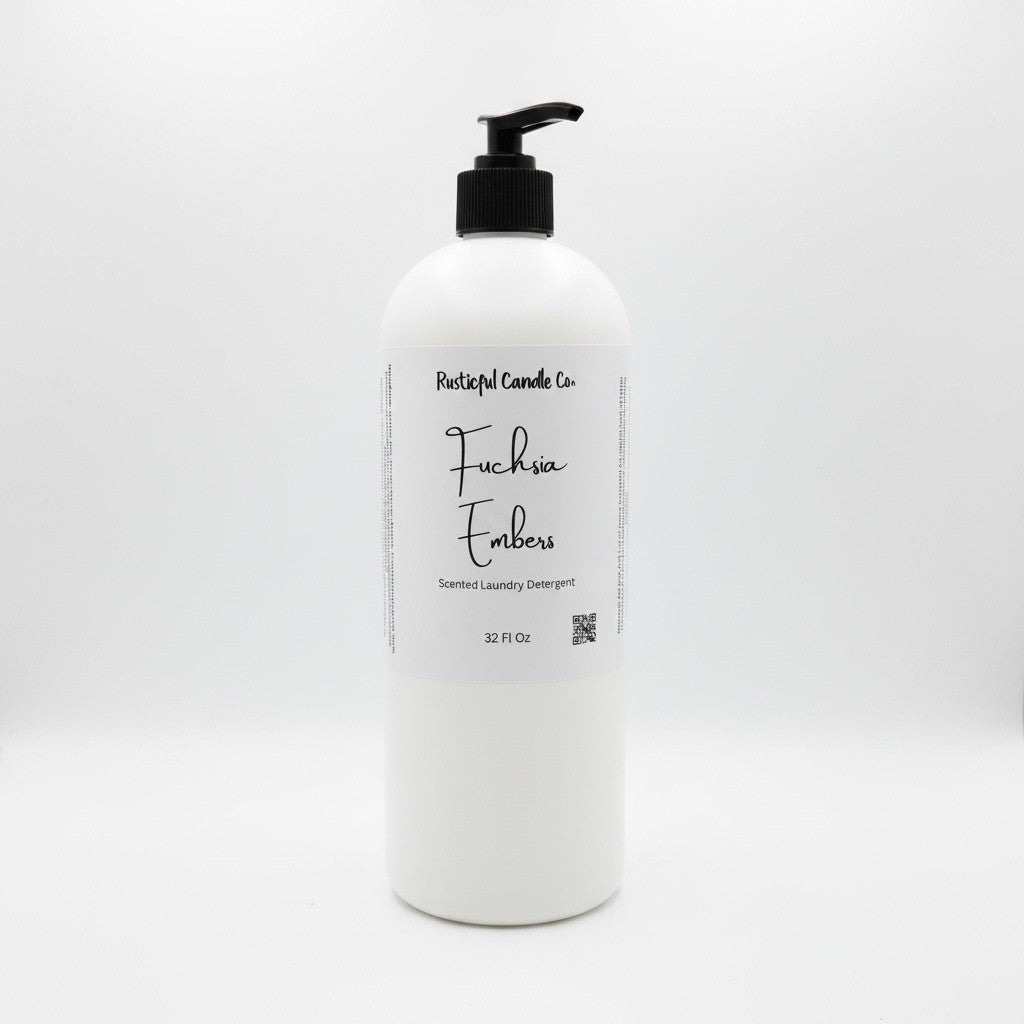 A 32 fl oz white plastic bottle of Rustical Candles Co. 'Fuchsia Emboss' laundry detergent with a black pump dispenser and a white label, set against a seamless white background.