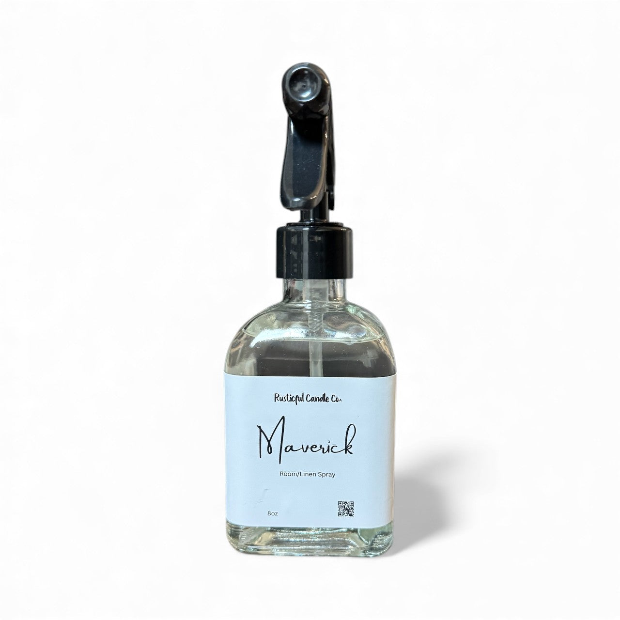 Clear spray bottle with a label on a white background