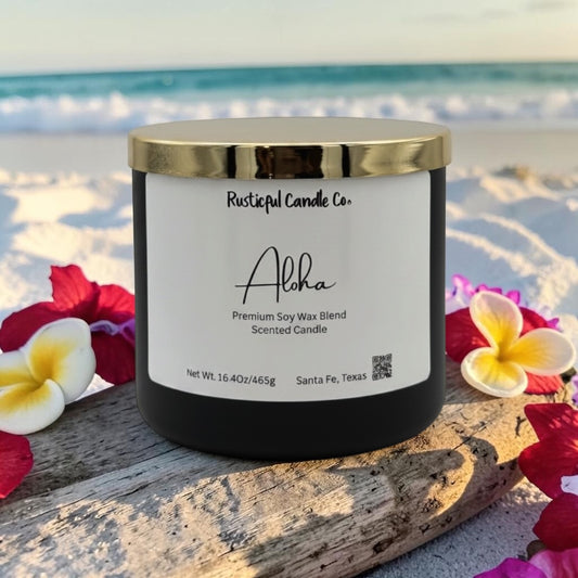 Candle with 'Rusticful Candle Co.' label on a beach setting
