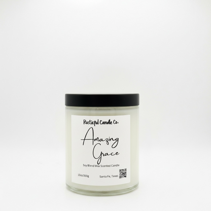Candle with 'Amazing Grace' label on a white background