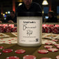 Candle labeled 'Baccarat Red' from Rusticful Candle Co. on a poker table with cards and chips.