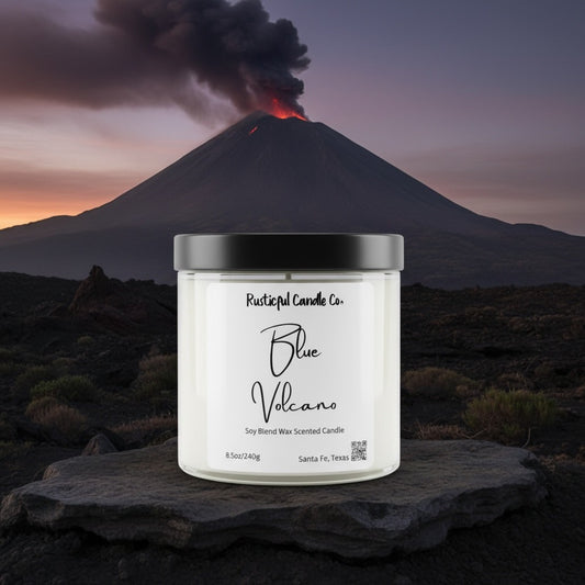 Candle labeled 'Blue Volcano' by Rusticful Candle Co. with a volcano in the background