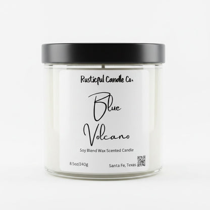 Candle jar labeled 'Blue Volcano' by Rusticul Candle Co. on a white background