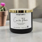 Candle labeled 'Cactus Flower' from Rusticful Candle Co. on a neutral background with a cactus plant.