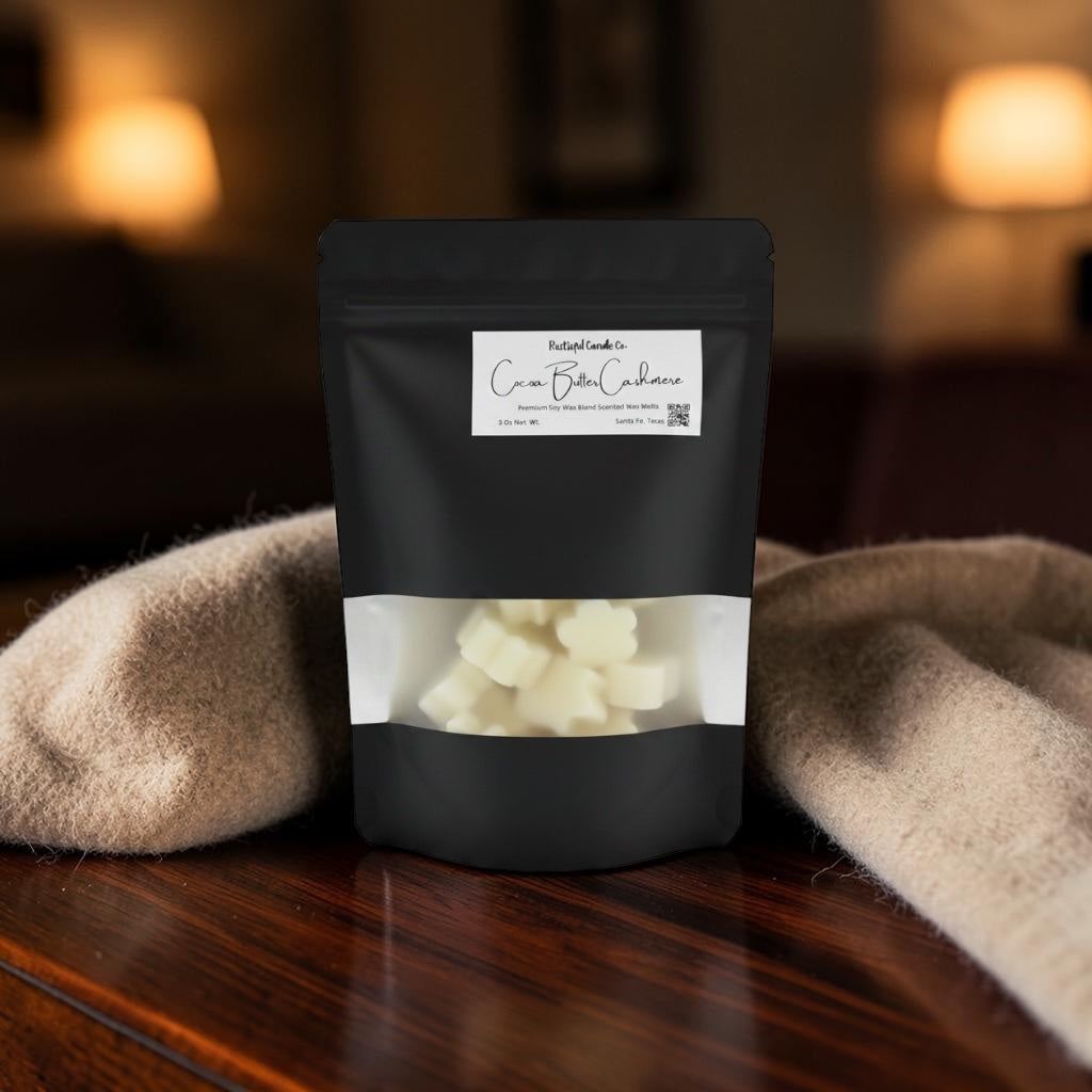 Black packaging of cream butter cashews on a wooden surface with a blurred background