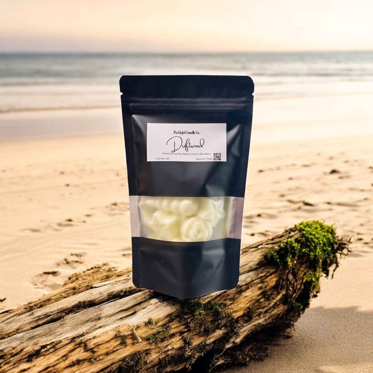 Black packaging with a label on a beach