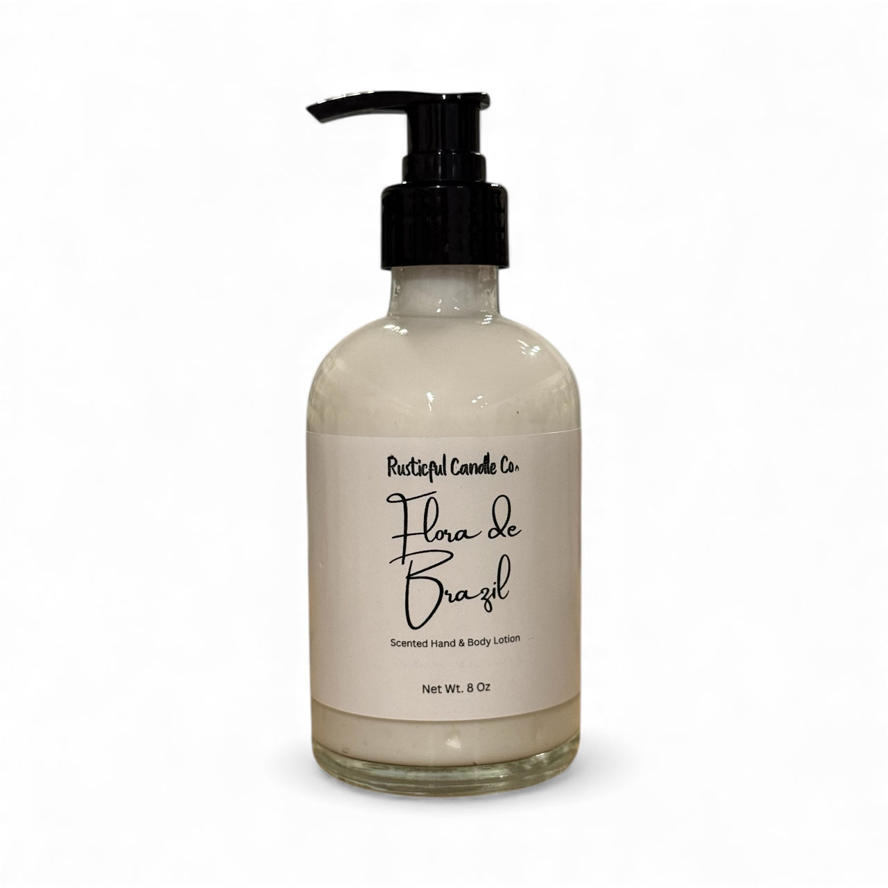 Hand and body lotion bottle labeled 'Flora de Brazil' on a white background