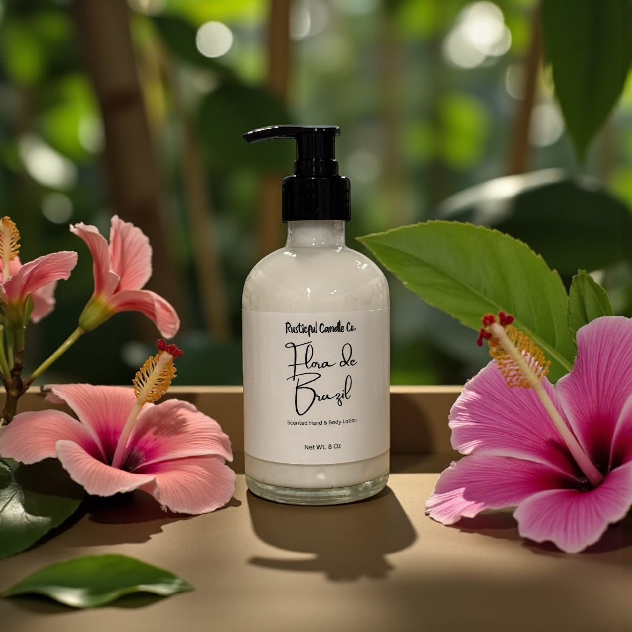 Hand cream bottle labeled 'Flora de Brazil' with pink flowers and green leaves in the background