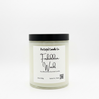 Candle with 'Forbidden Woods' label on a white background