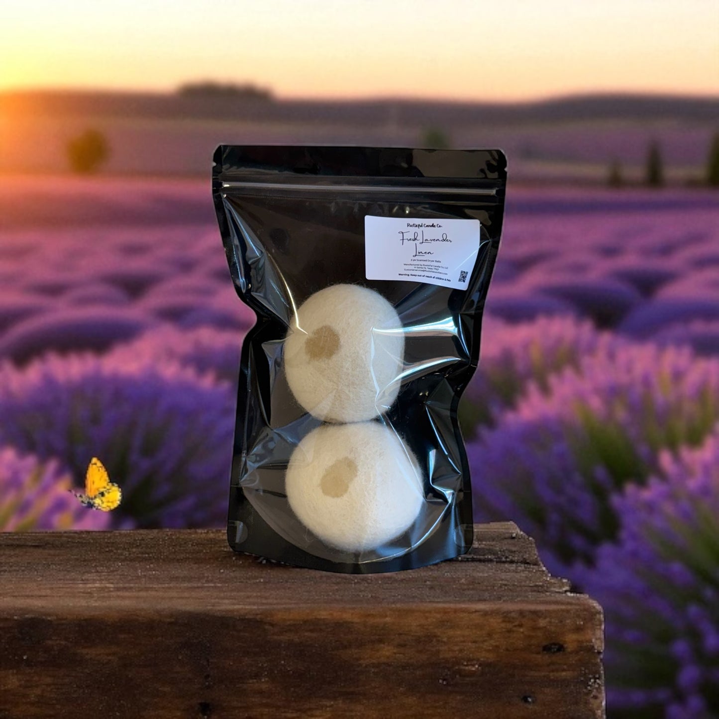 Packaged product on a wooden surface with a lavender field in the background