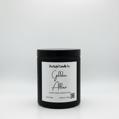 A black jar candle with a white label reading 'Rustical Candle Co. Golden Allure' on a light gray background.