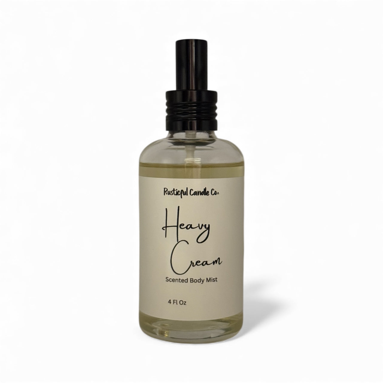 Bottle of 'Heavy Cream' scented body mist by Rustful Candle Co. on a white background