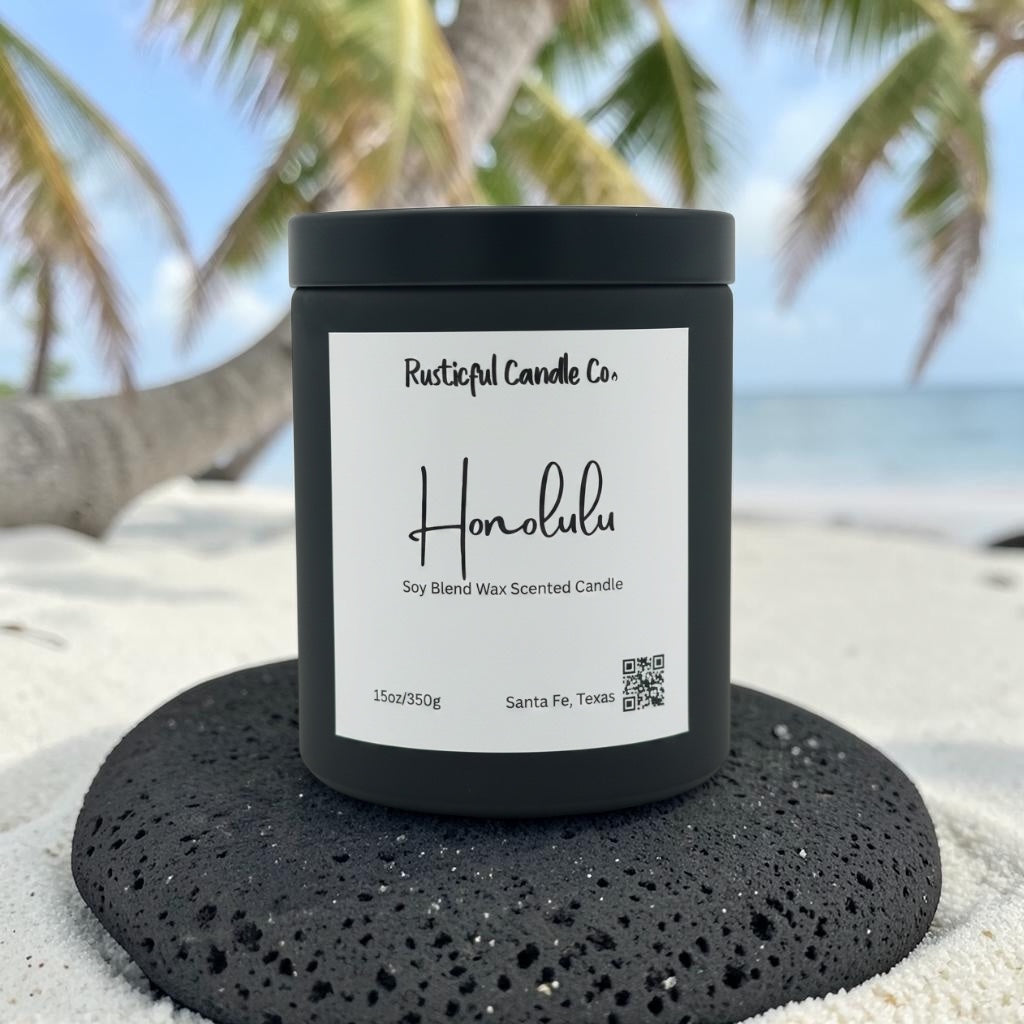 Honolulu candle on a volcanic rock with palm trees and ocean backdrop