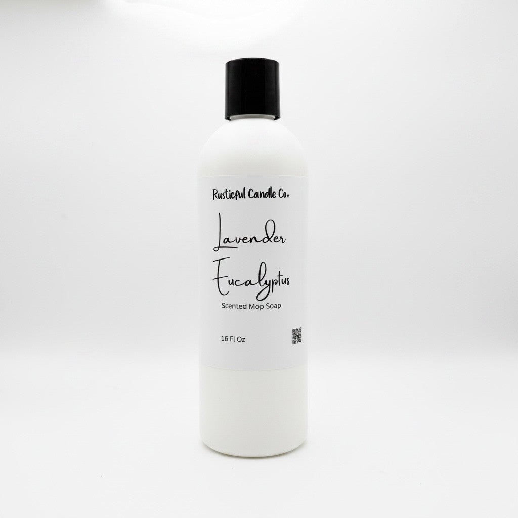 A 16 fl oz white plastic bottle of Rustical Candle Co. Lavender Eucalyptus Scented Mop Soap with a black cap, set against a plain white background.