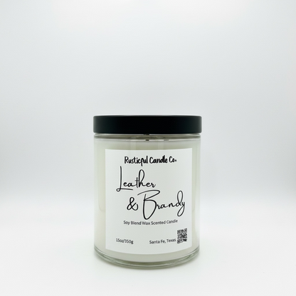 Candle jar labeled 'Leather & Brandy' by Rusticful Candle Co. on a white background