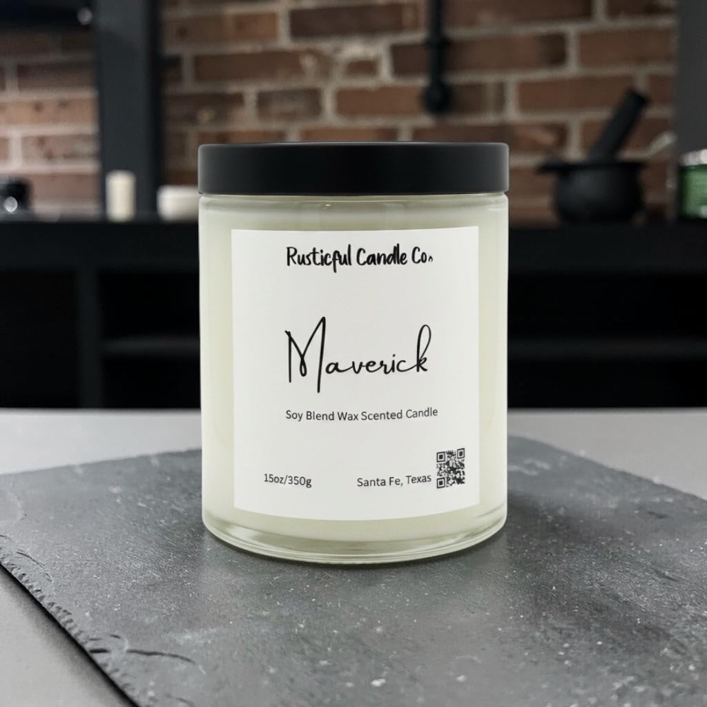 Candle labeled 'Maverick' from Rusticful Candle Co. on a dark surface with a brick wall background.