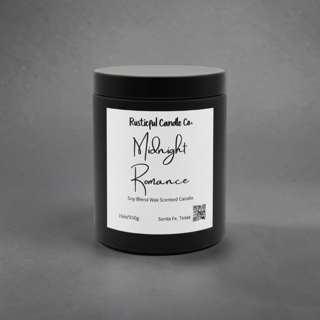 A black jar candle with a white label reading 'Rustical Candle Co. Midnight Romance' on a textured gray background.