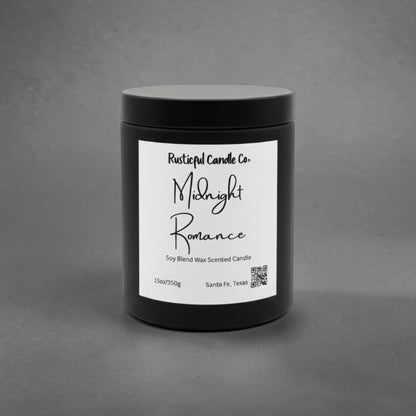 A black jar candle with a white label reading 'Rustical Candle Co. Midnight Romance' on a textured gray background.