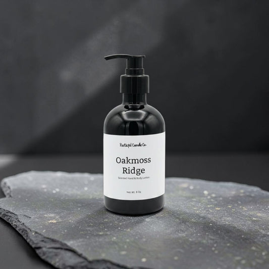 Black bottle labeled 'Oakmoss Ridge' on a dark stone surface with a black background
