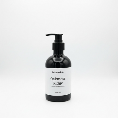 Black bottle of 'Oakmoss Ridge' hand and body lotion on a white background