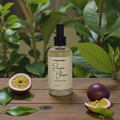 Bottle of 'Passion Blossom' scented body mist with passion fruit and leaves on a wooden surface