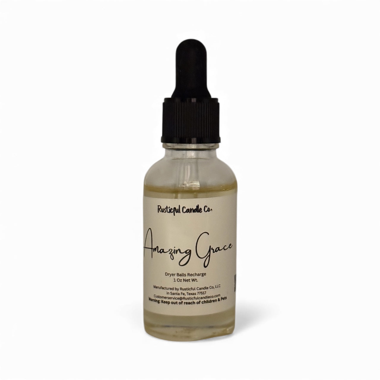 Bottle of 'Amazing Grace' dryer sheet refill with a dropper on a white background