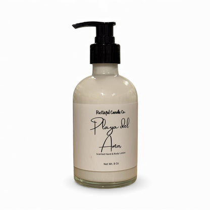 Hand and body lotion bottle labeled 'Playa del Amor' on a white background