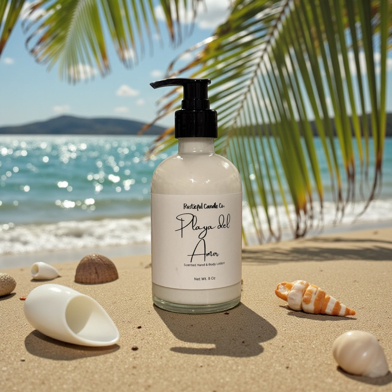 Lotion bottle labeled 'Playa del Amor' on a sandy beach with shells and palm leaves.
