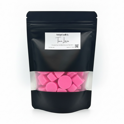 Black packaging of pink wax melts with a visible brand label on a white background