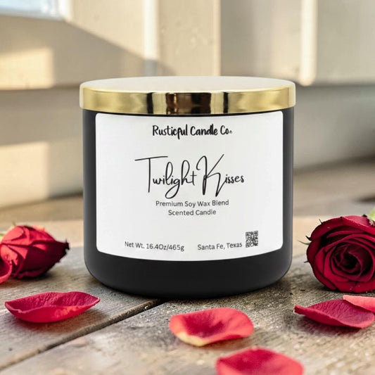 Candle with a label on a wooden surface with red roses and petals