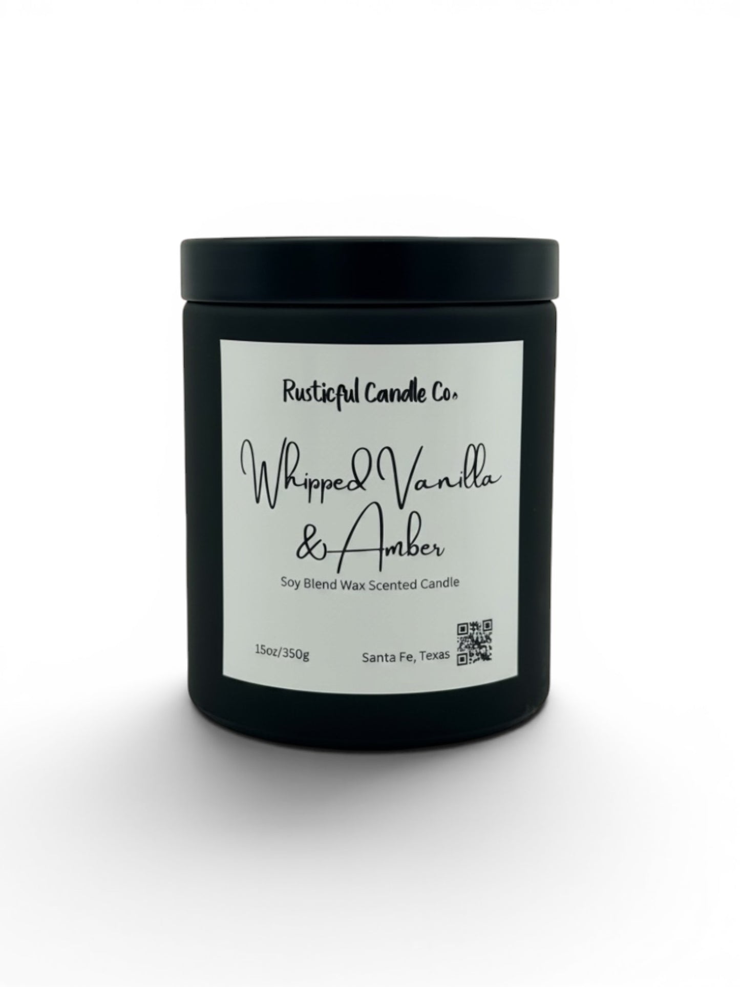 A black jar candle with a white label reading 'Rusticalful Candle Co. Whipped Vanilla & Amber' on a clean white background.