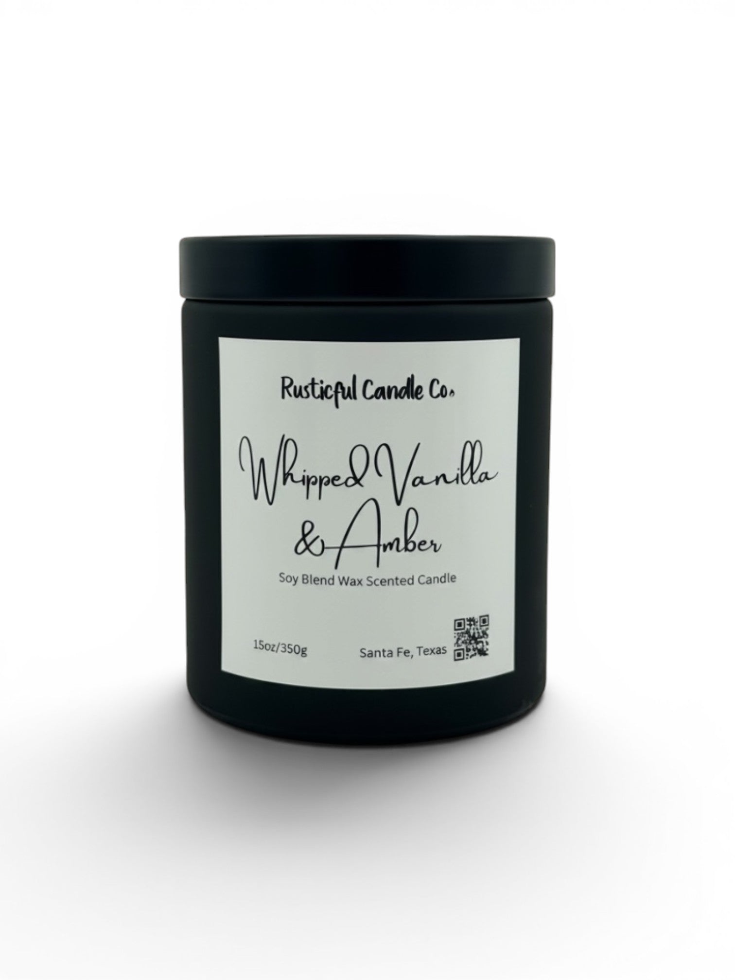 A black jar candle with a white label reading 'Rusticalful Candle Co. Whipped Vanilla & Amber' on a clean white background.