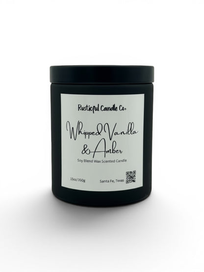 A black jar candle with a white label reading 'Rusticalful Candle Co. Whipped Vanilla & Amber' on a clean white background.